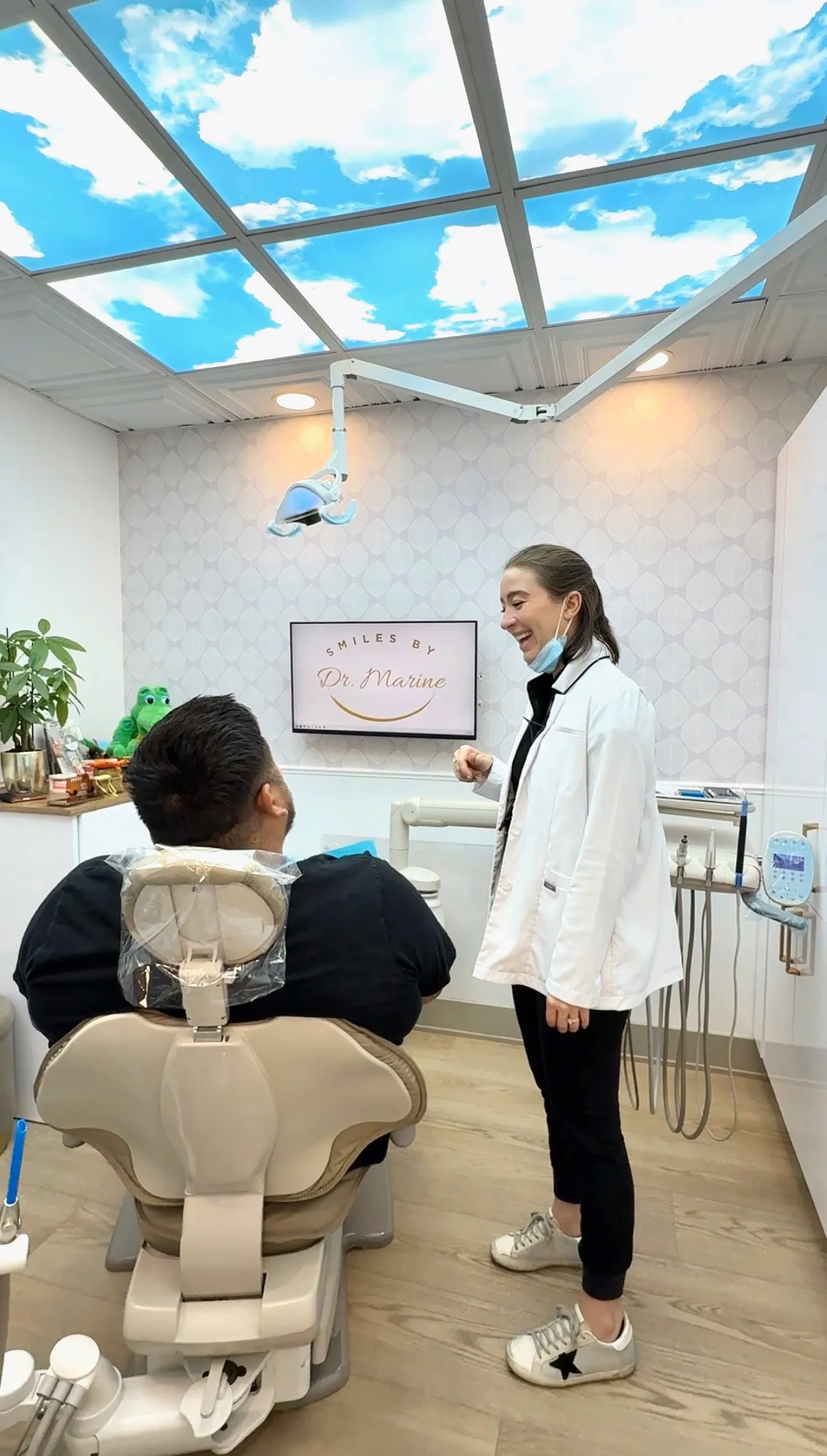 Dentist and patient in a treatment room at Pacific Dental Care