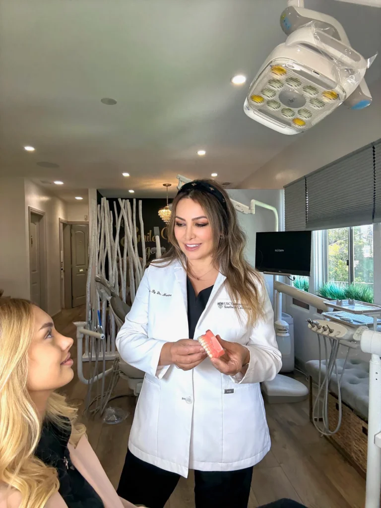Dentist talking with a patient at Pacific Dental Care